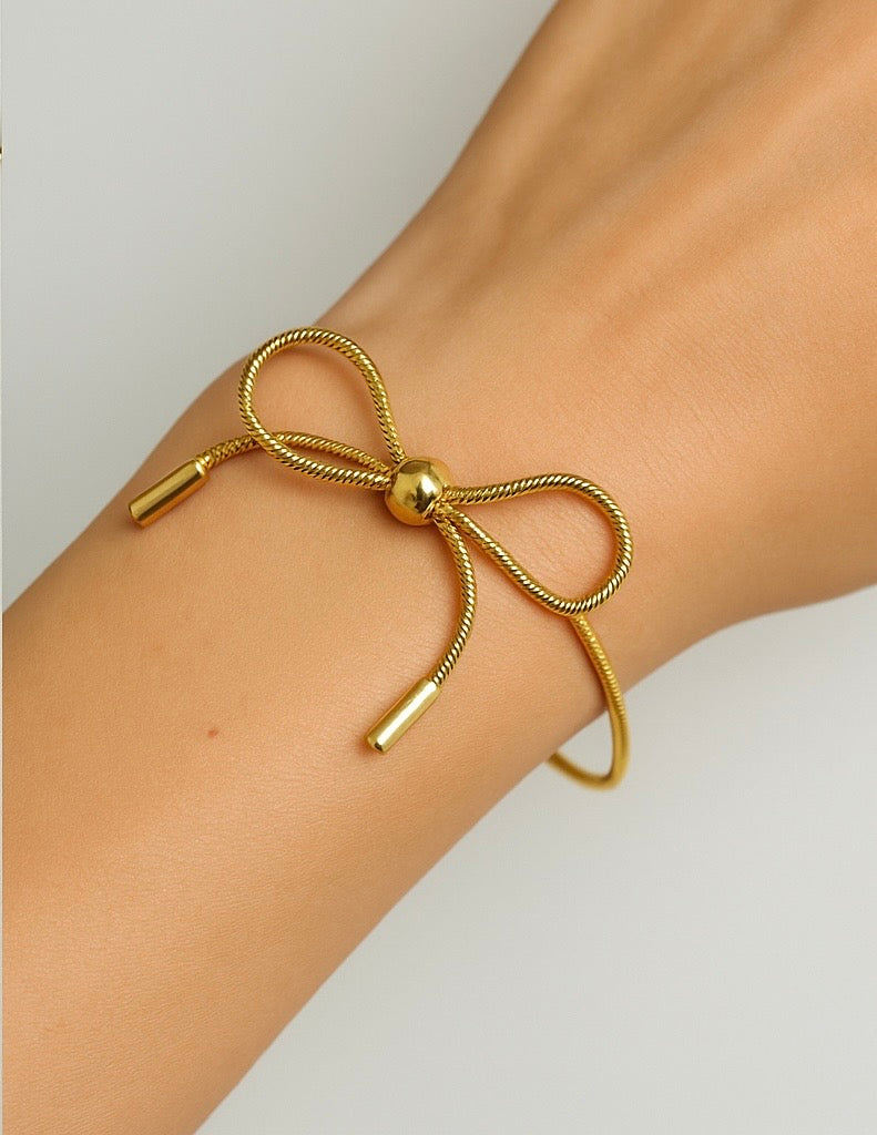 Golden Bow Whisper Bracelet