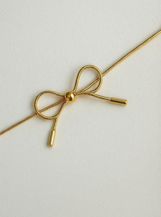 Golden Bow Whisper Bracelet