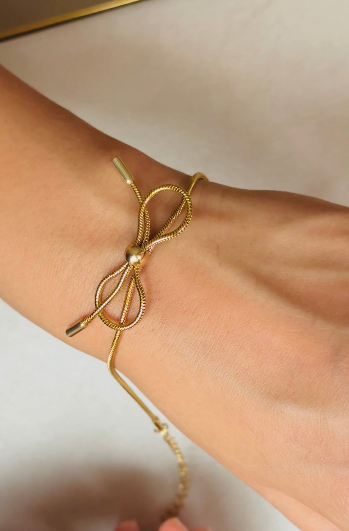 Golden Bow Whisper Bracelet
